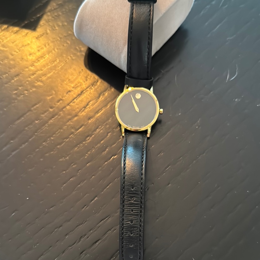 Elegant Black and Gold Watch
